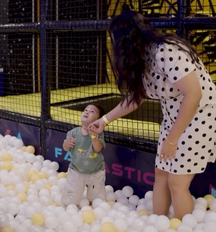 A child enjoying the bumper car ride at Wooray's indoor play area
